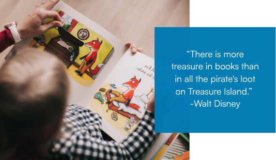 Image of a teacher at Evolve Education reading with a young child